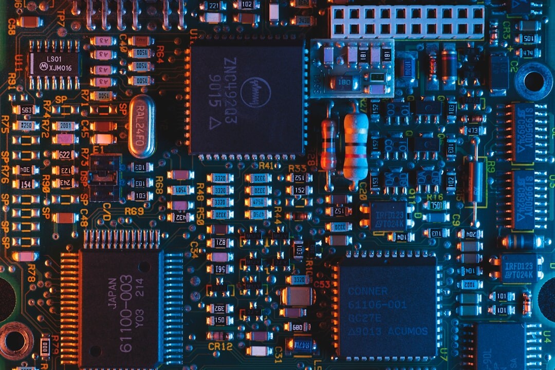 Cybersecurity padlock on digital circuit board with neon blue lighting